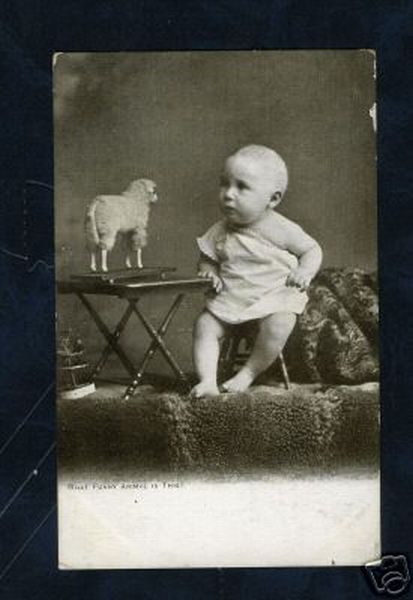 Baby with Toy Sheep