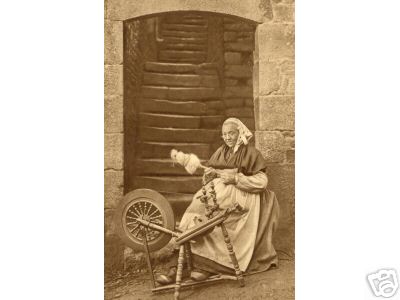 Brittany Spinning Wheel and Lady at Dinan 1903