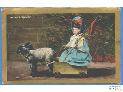 Child in Cart Drawn By Lamb