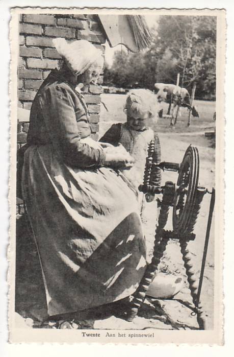 Old Dutch Woman Teaching Child to Spin