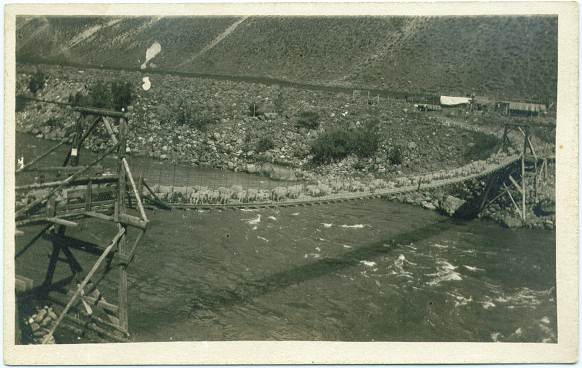 Sheep Crossing the Big Salmon River on a Bridge