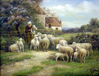 Woman and Baby Feeding the Sheep