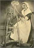 Irish Woman Spinning on Castle Wheel W Cat